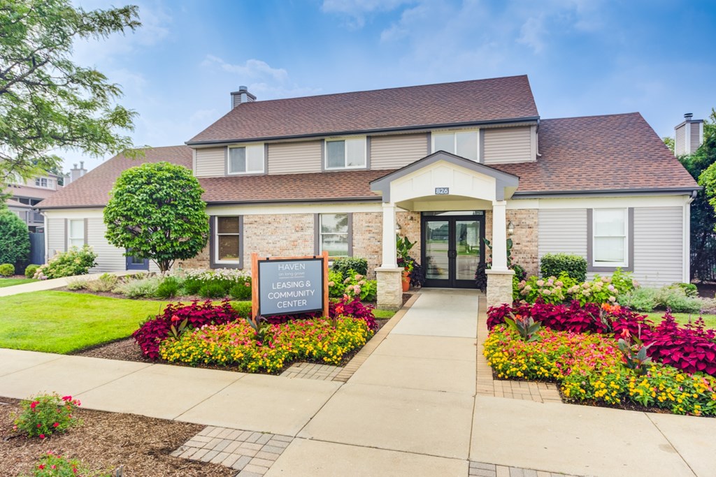A building with a sign that says "Community Center" in front of it.