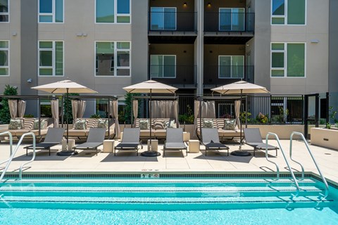 pool with lounge chairs