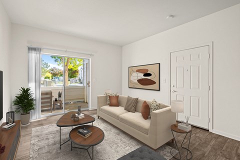 A living room with a couch, a coffee table, and a painting on the wall.