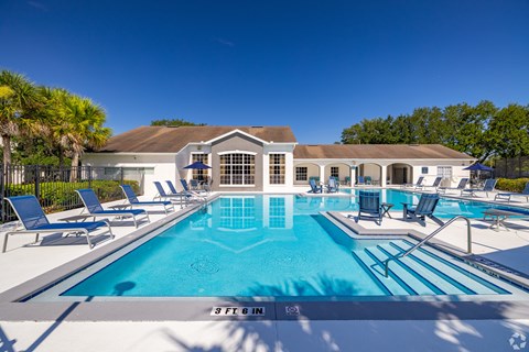 A large swimming pool with a 3 ft depth sign.