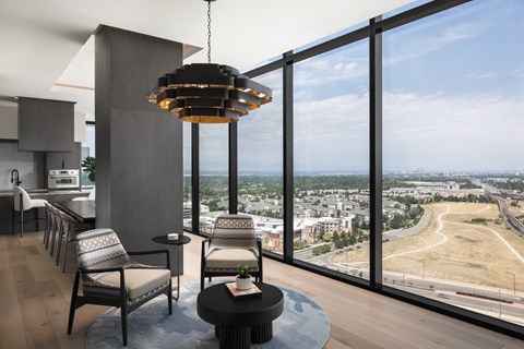 A modern living room with a view of the city.