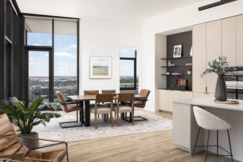 A modern dining room with a view of the city.