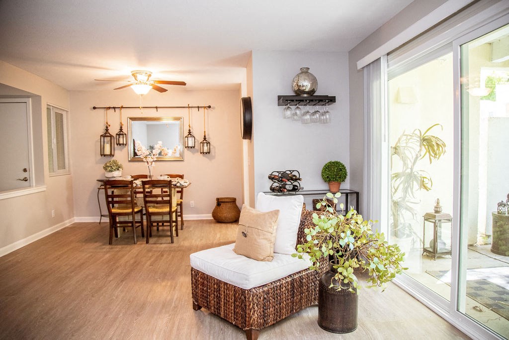 a living room with a couch and a dining room table