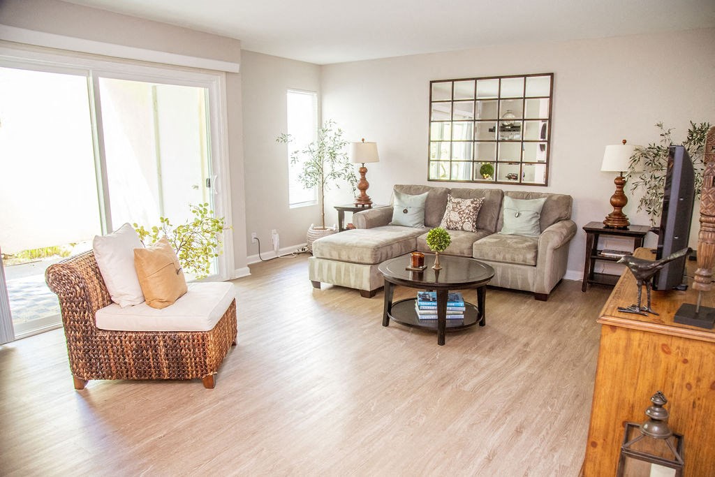 a living room with a couch and a table