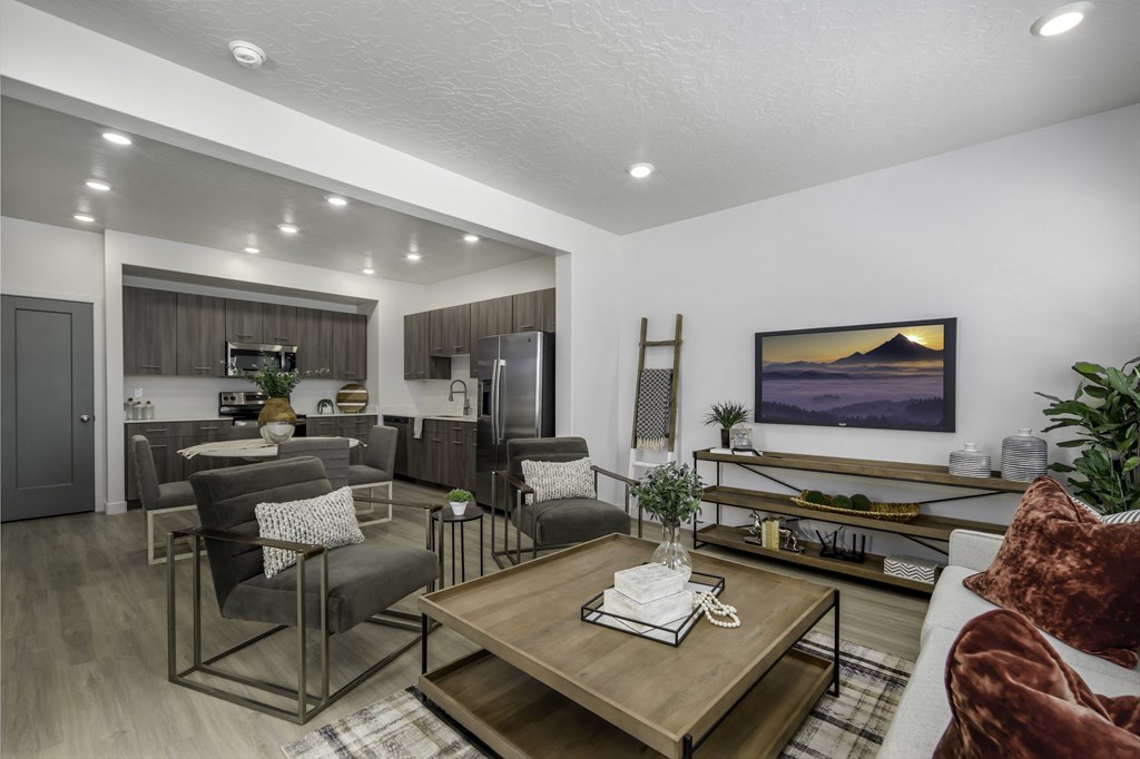 the living room of a home with a couch and a table