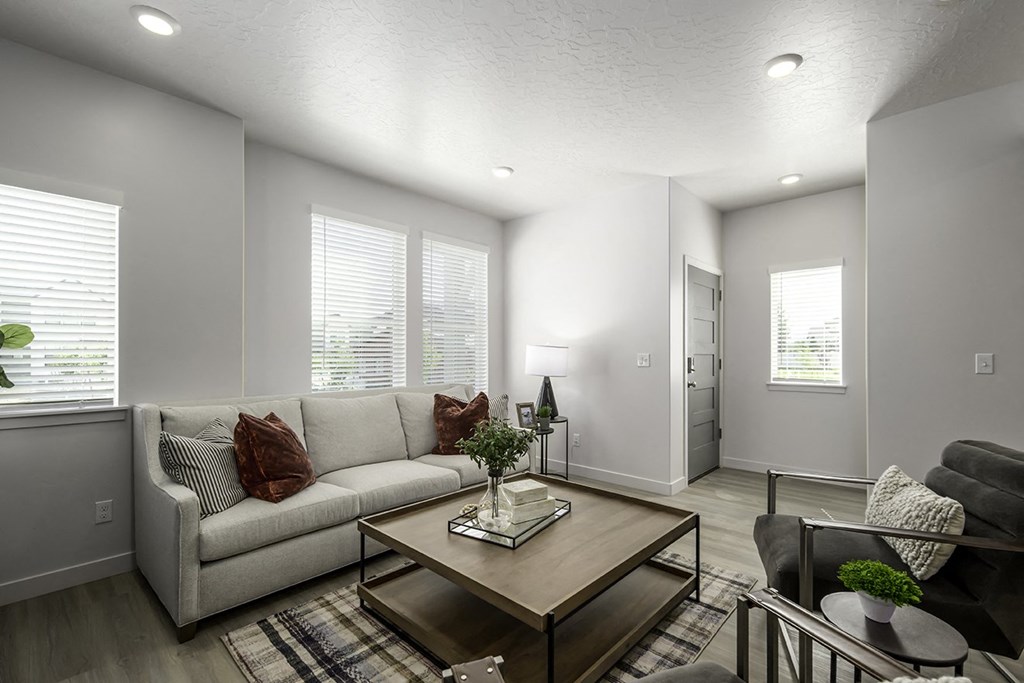 a living room with a couch and a coffee table