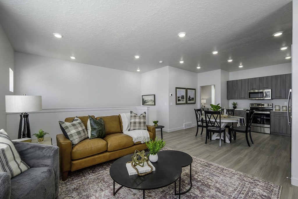 a living room with a couch and a table