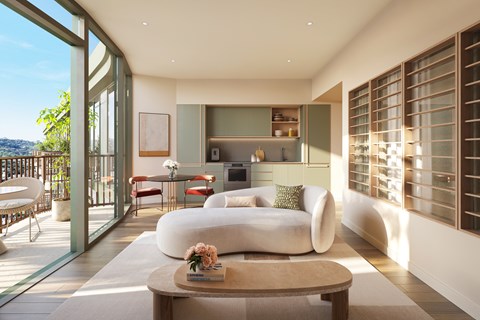 A modern living room with a large white sofa and a coffee table.