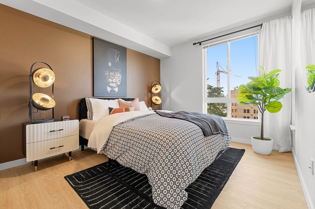a bedroom with a bed and a window at Ion Town Center, Shoreline, WA 98133