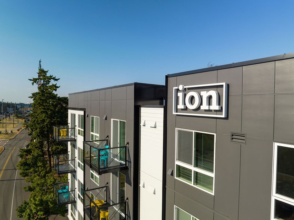 a picture of the lion building with a blue sky in the background at Ion Town Center, Washington, 98133
