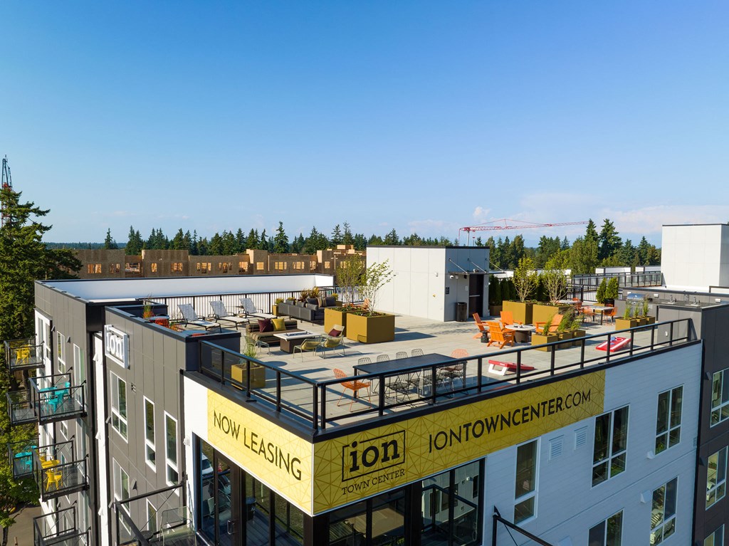 a view from the top of a building of a construction site with a crane in the background at Ion Town Center, Washington