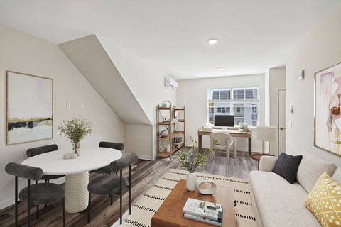 a living room with a couch and a table