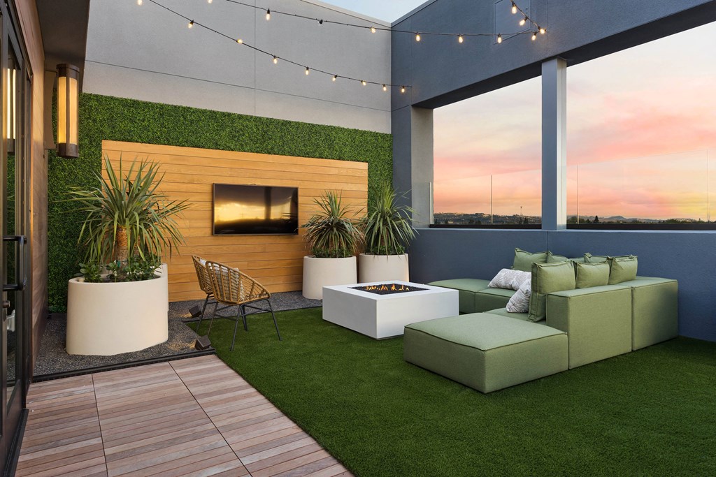 a rendering of a living room with green turf