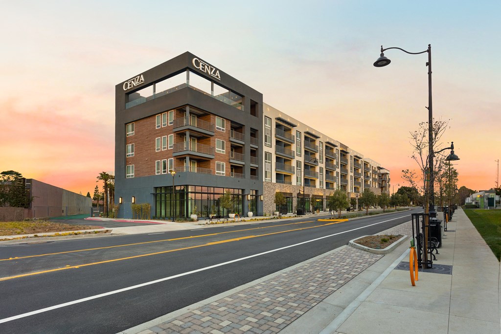 a rendering of an apartment building on a city street