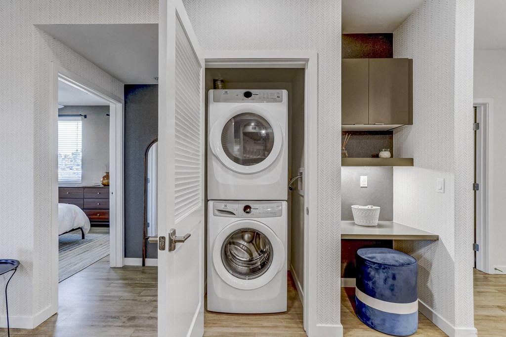 Wsher and dryer in a small laundry room at Array La Mesa, La Mesa, CA 91942