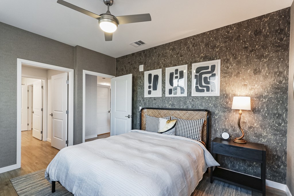Bedroom with a large bed and a ceiling fan at Array La Mesa, La Mesa