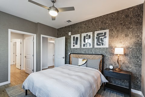 Bedroom with a large bed and a ceiling fan at Array La Mesa, La Mesa