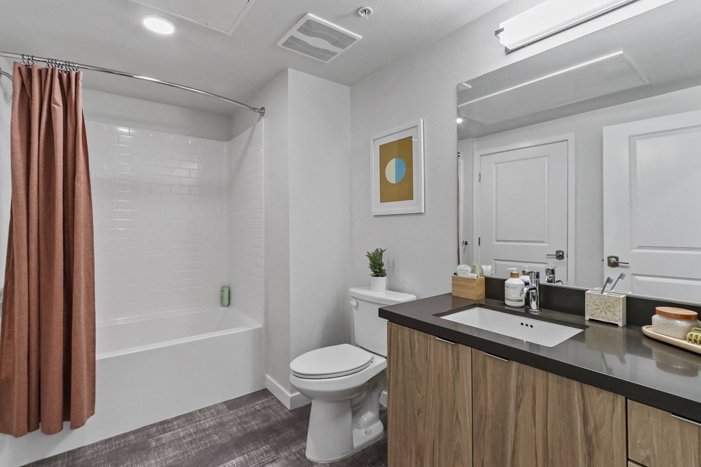 Bathroom with a bathtub at Array La Mesa, La Mesa, 91942