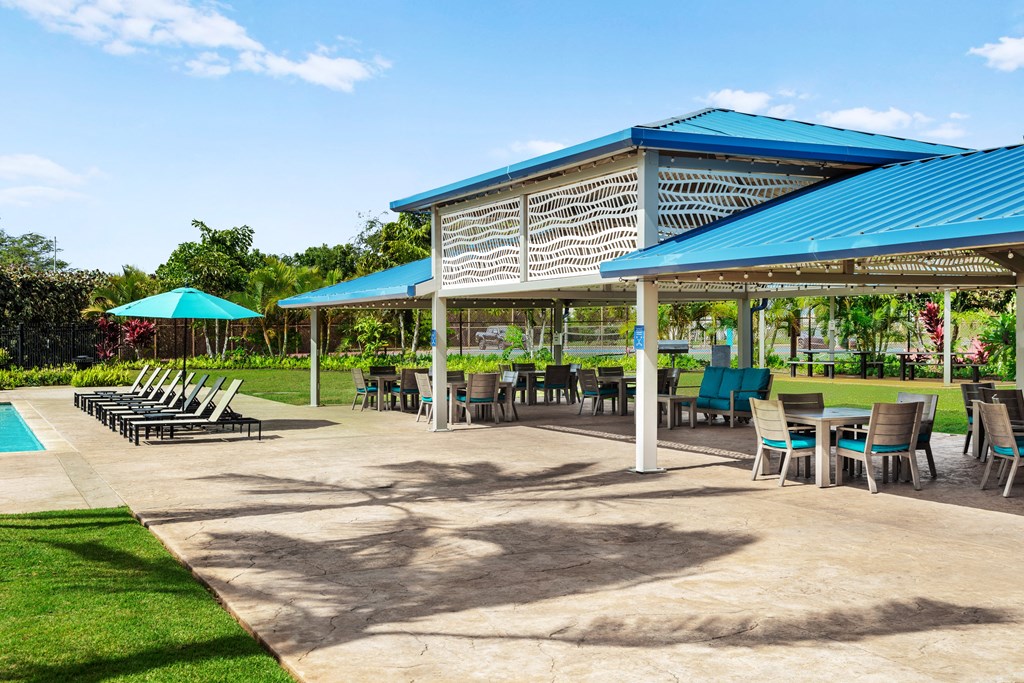 covered bbq area by pool.
