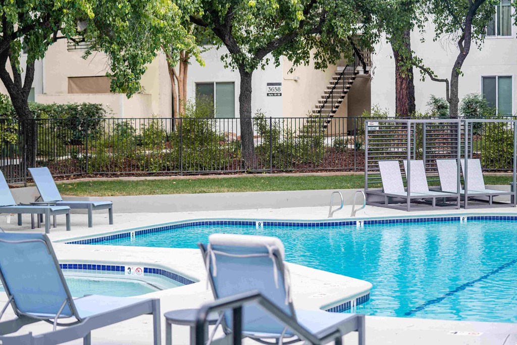 our apartments showcase an outdoor pool and hot tub