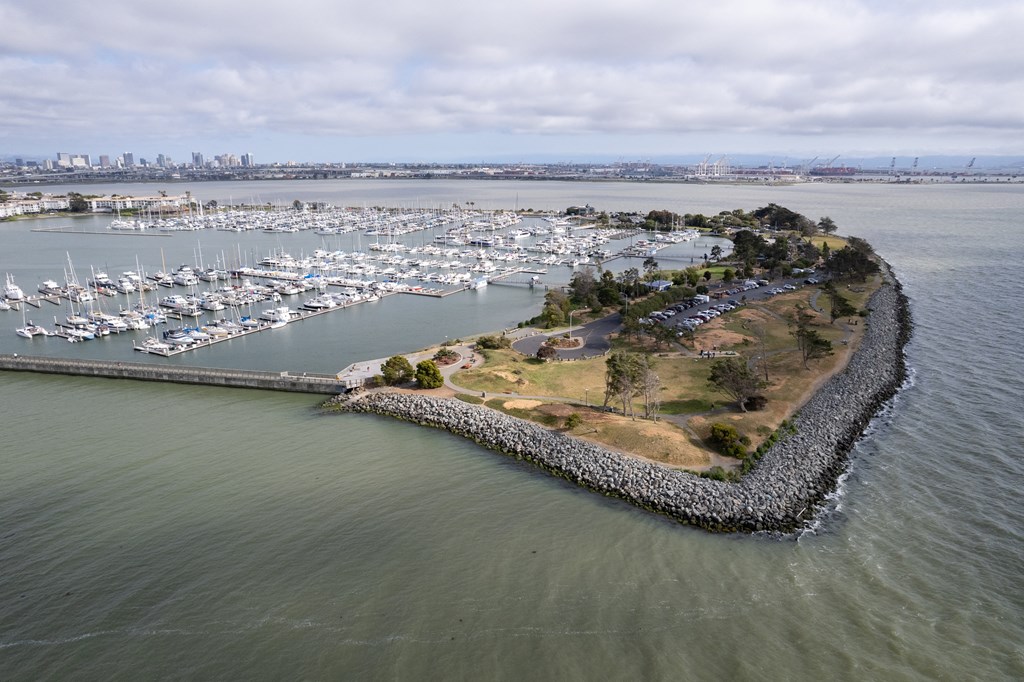 an aerial view of alcatraz island with the san francisco skyline in the background