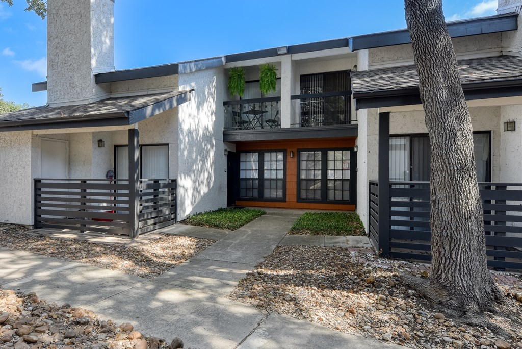 a building with a tree in front of it