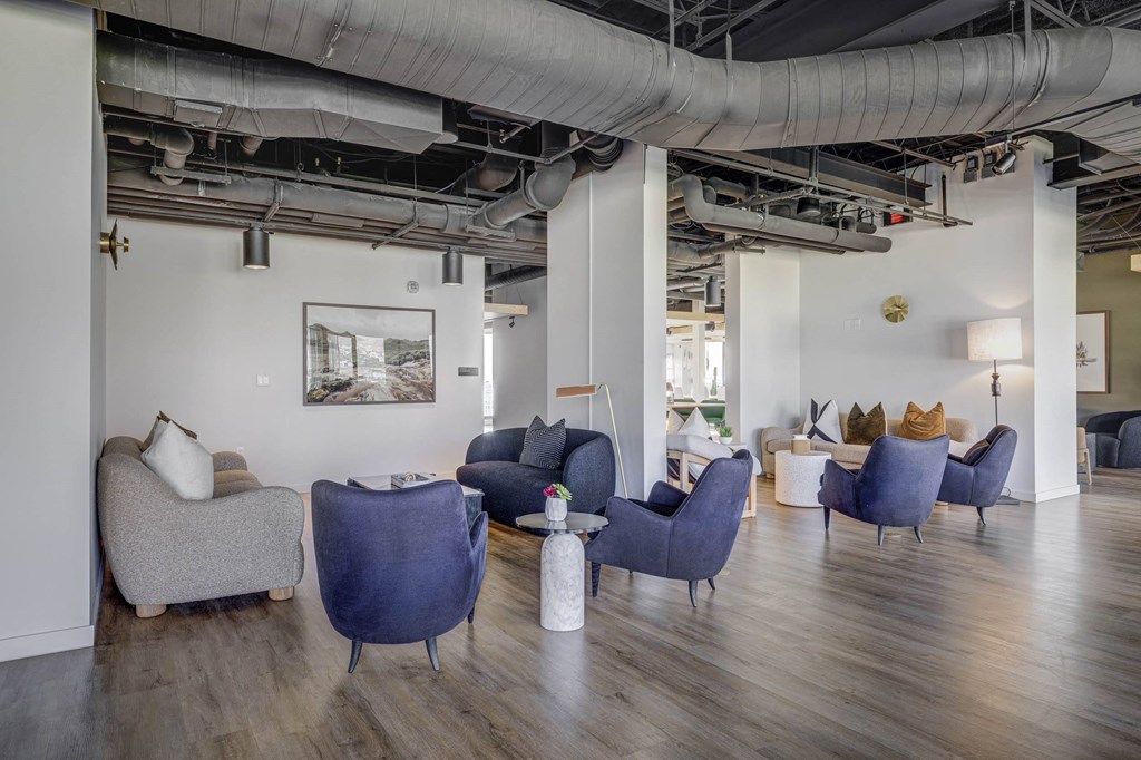 a room filled with couches and chairs