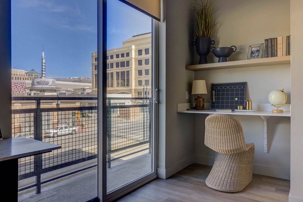 A modern room with a chair and a desk.