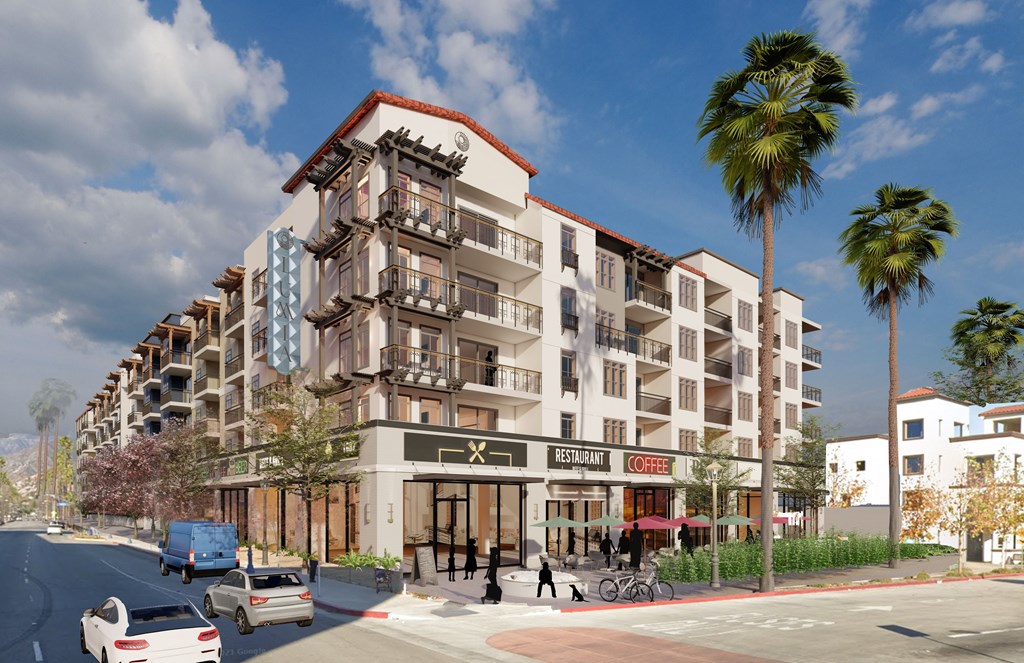 a rendering of an apartment building on a city street