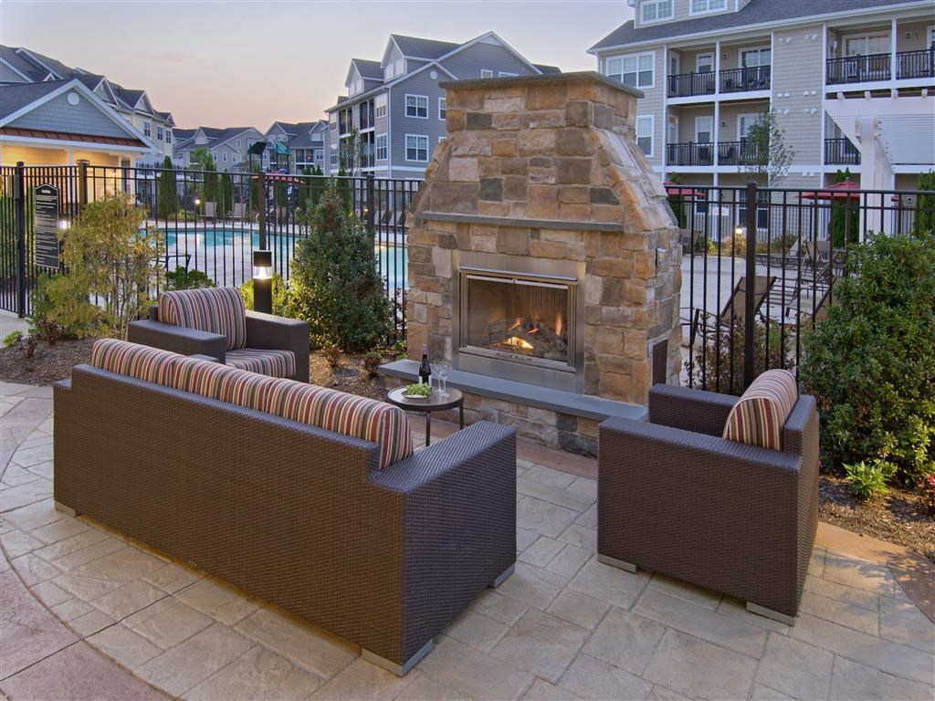 Outdoor courtyard with fire pit at The Preserve at Cohasset, Cohasset
