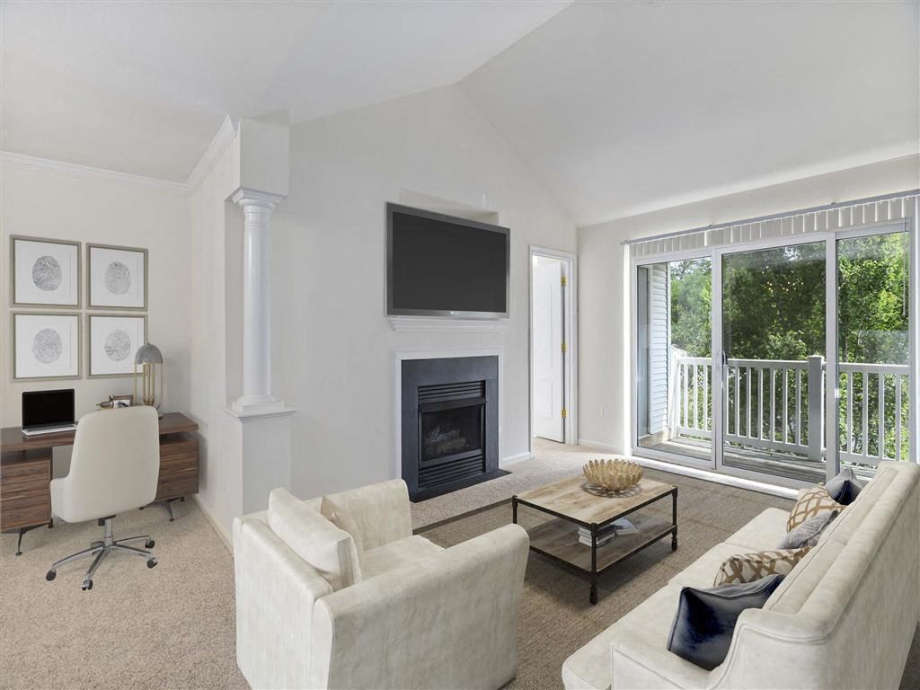 a living room filled with furniture, fireplace and a flat screen tv