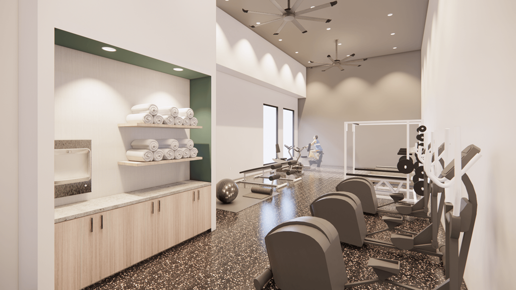 a fitness room with chairs and a counter with weights and a treadmill