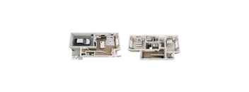 Two white floor plans of a house with a kitchen, living room, and bedrooms.