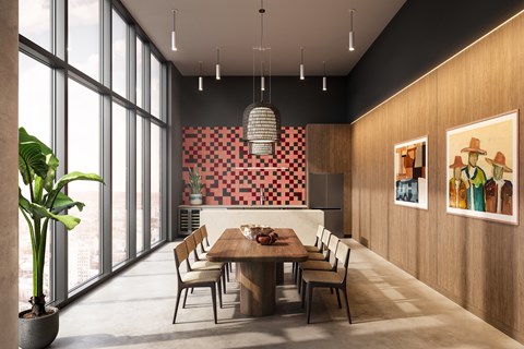 A modern dining room with a large table and chairs.