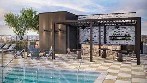A modern outdoor pool area with a glass bar and lounge chairs.