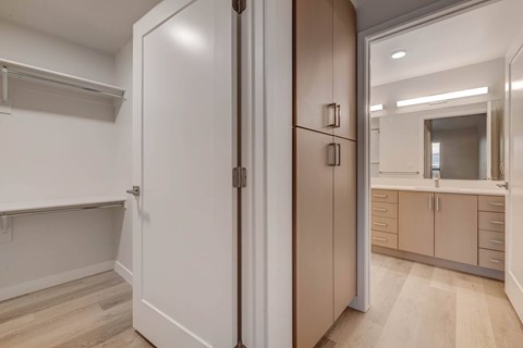 A white door with a handle is open.