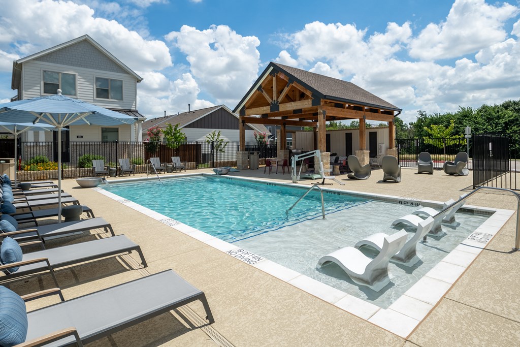 our apartments have a resort style pool with lounge chairs