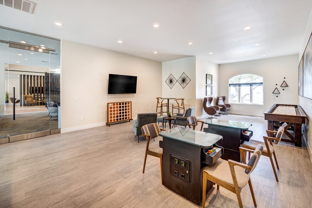 Game room with pool, shuffle board and video games
