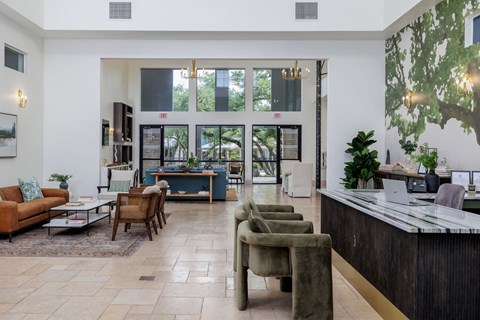 Leasing center with modern furniture and mural on wall