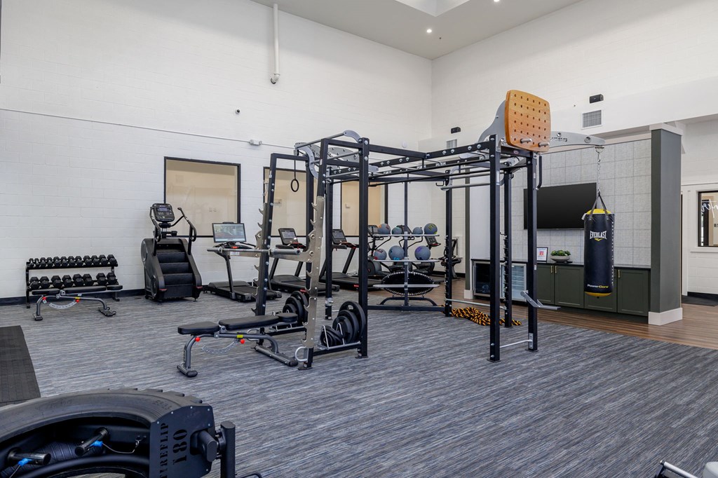 Apartment complex fitness center with strength and cardio equipment