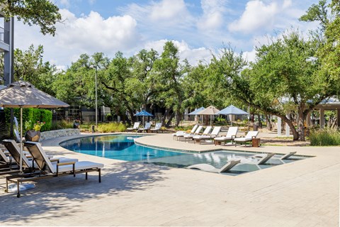 Pool with aqua lounge chairs