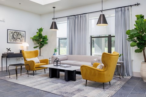 Couch and chairs in a bright lounge area