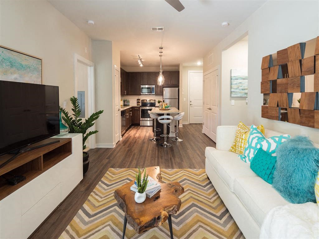 a living room with a couch and a table