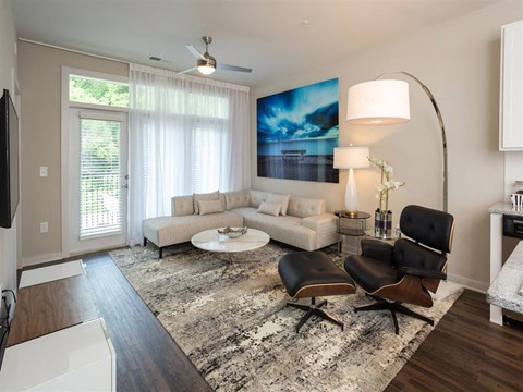 a living room with a couch and a chair
