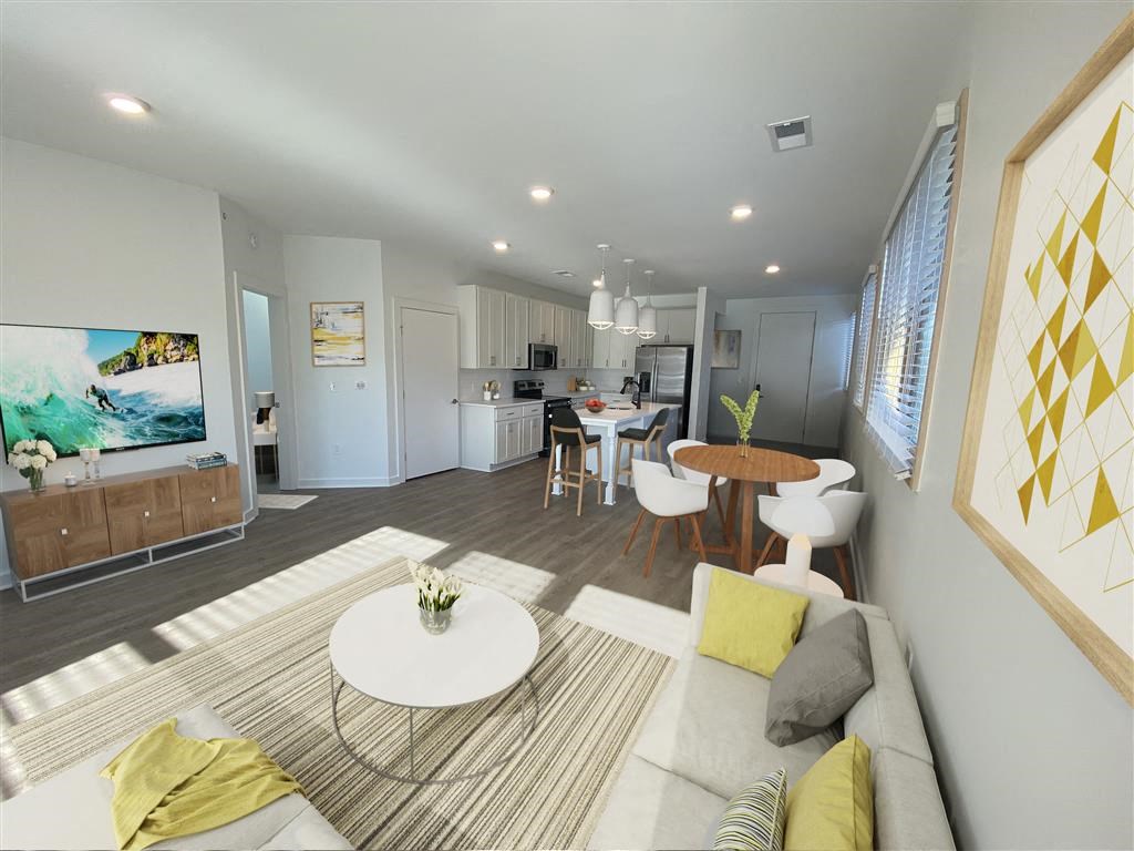 a living room with a couch a table and a tv