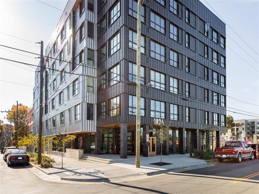 a building on the corner of a city street
