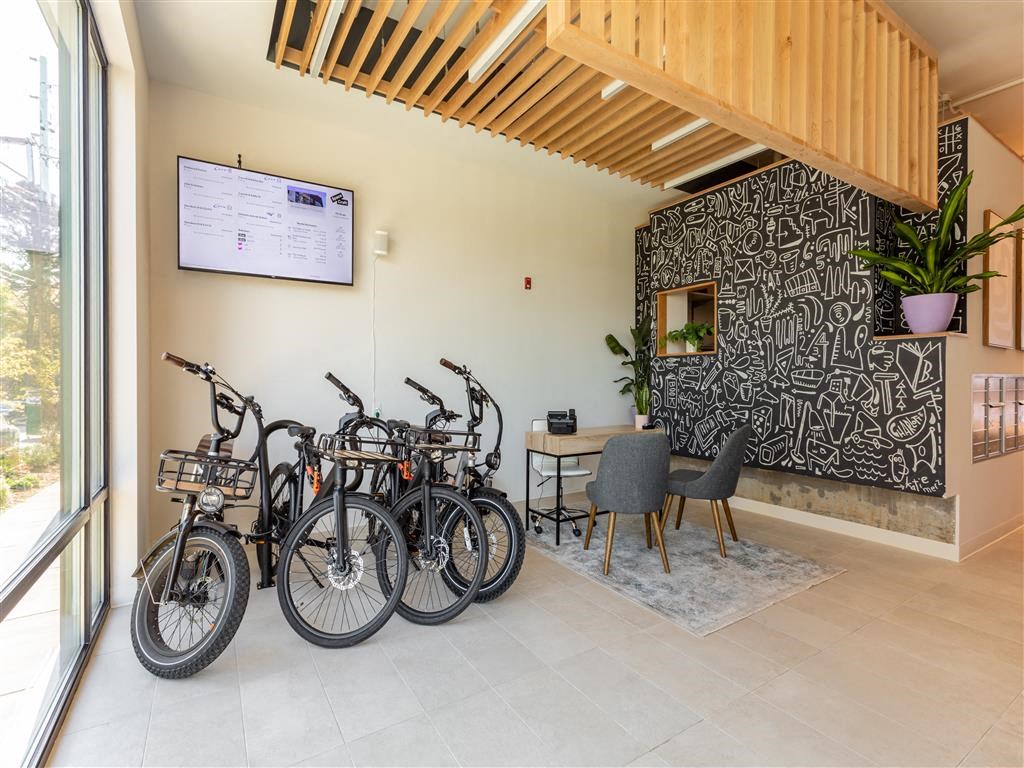 a group of bikes parked in the lobby of a building