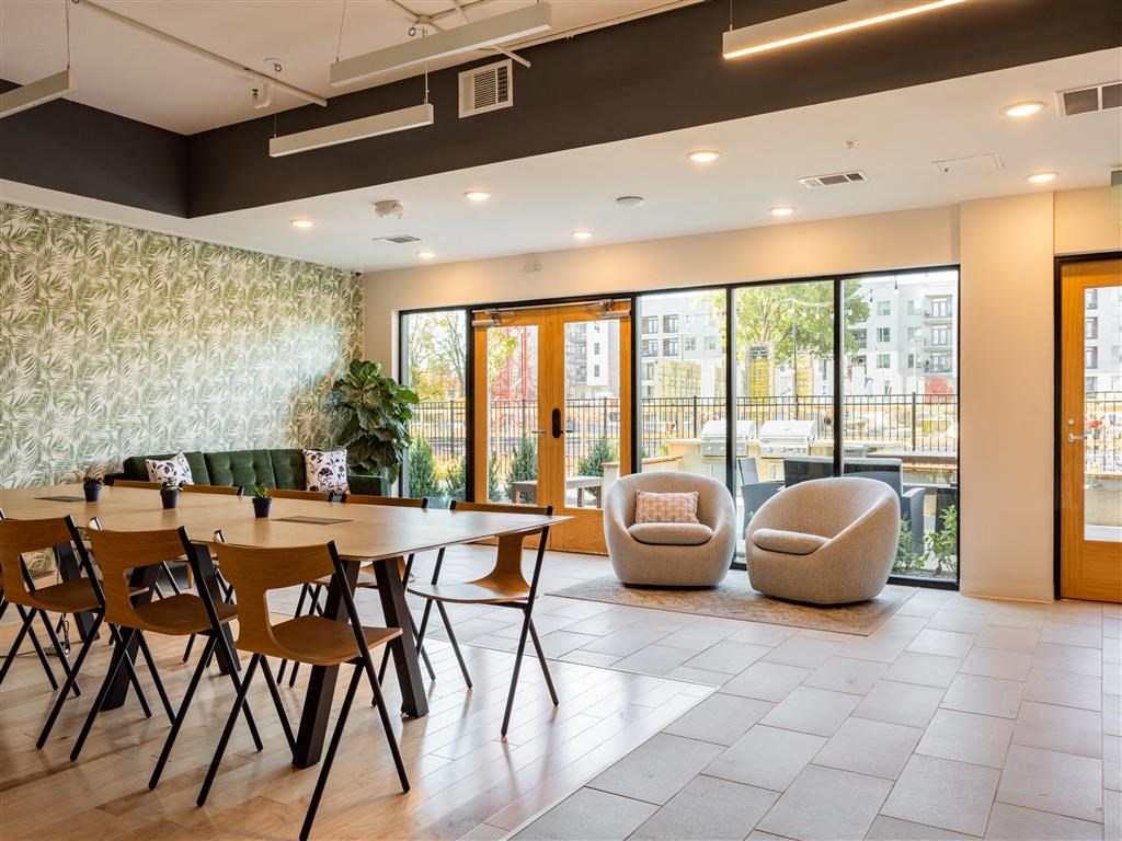 a conference room with a table and chairs