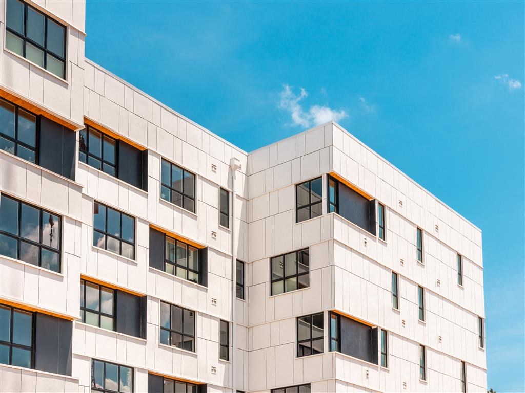 a building with a blue sky in the background