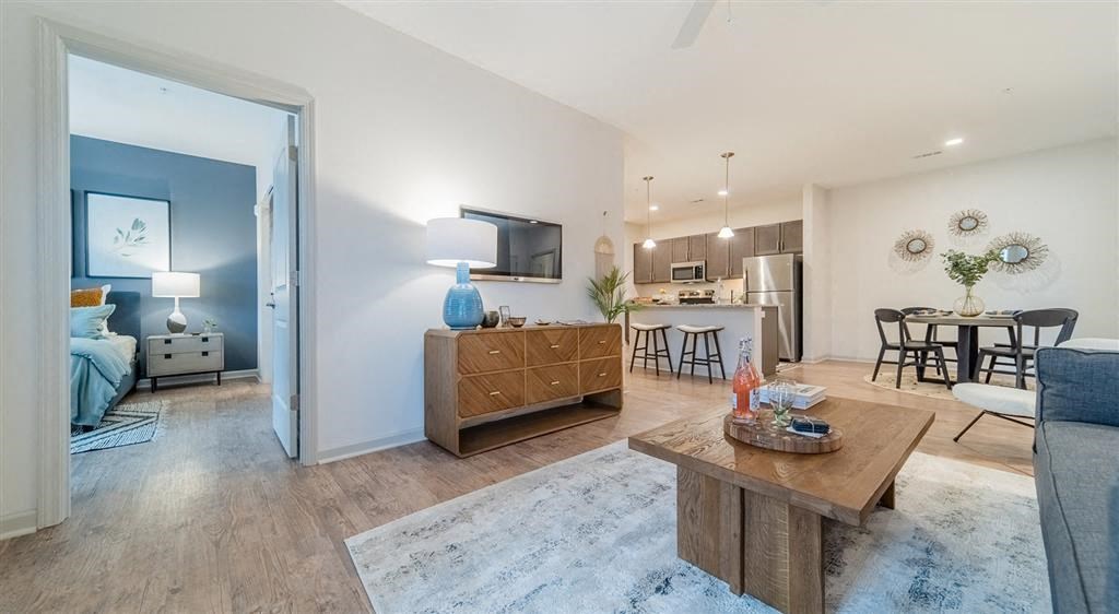 a living room with a couch and a table